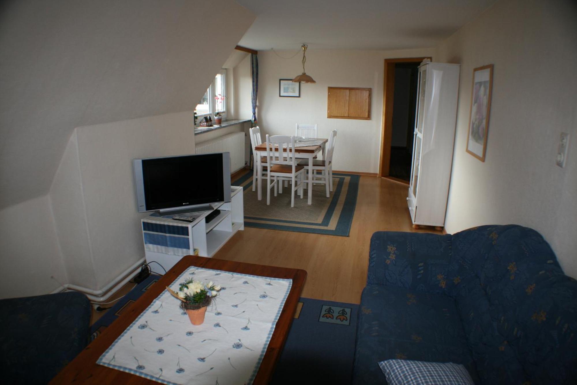 Ferienwohnungen Im Hotel Garni Zur Post Utersum Habitación foto